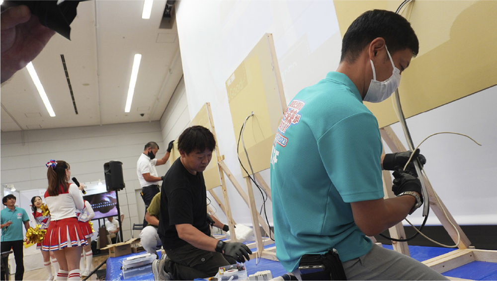 前回展示会の施工実演の様子